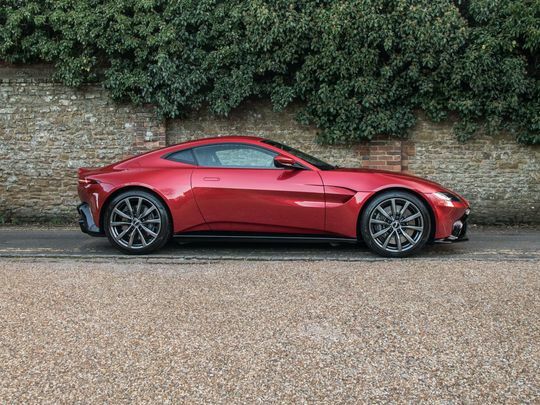 Compare Aston Martin V8 Automatic  Red