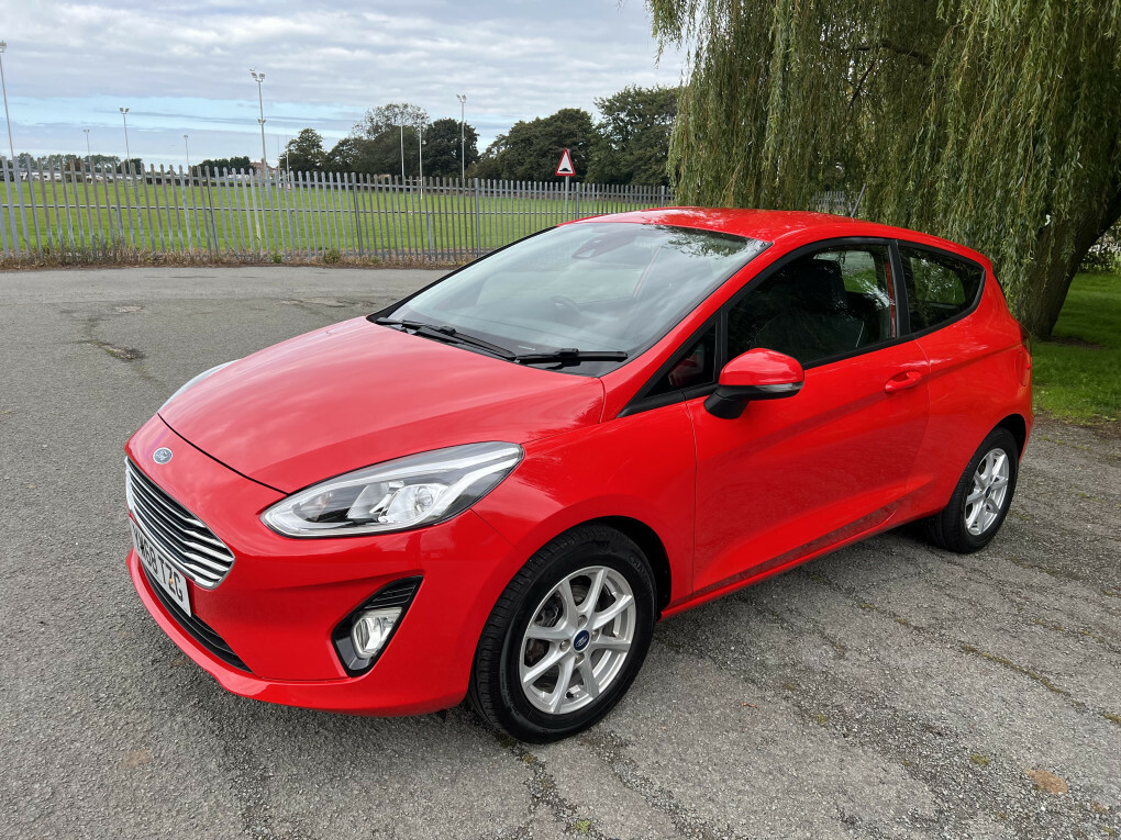 Compare Ford Fiesta Zetec YW68TZG Red