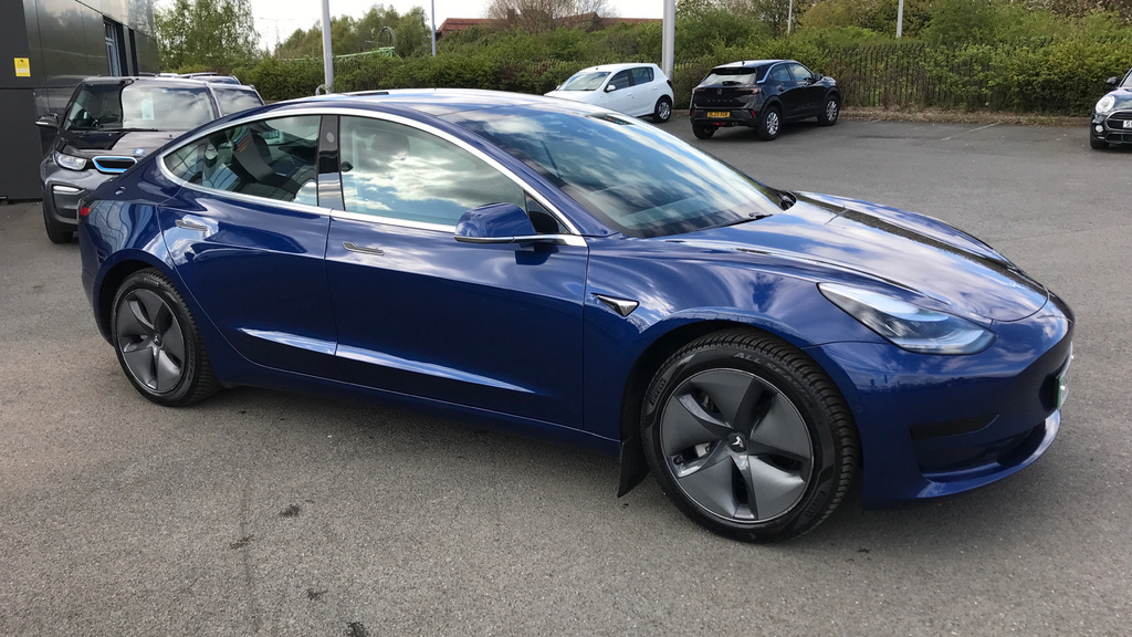 Compare Tesla Model 3 Standard Plus YF69DHK Blue