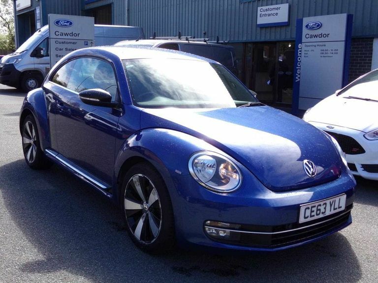 Compare Volkswagen Beetle Sport Tsi CE63YLL Blue