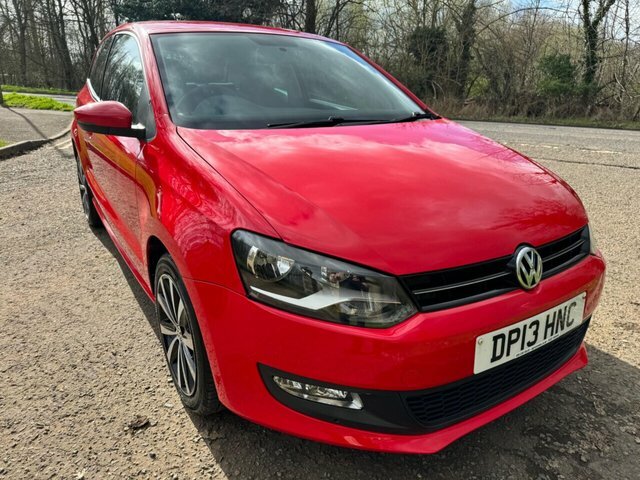 Compare Volkswagen Polo 1.2L Match Edition 59 Bhp DP13HNC Red