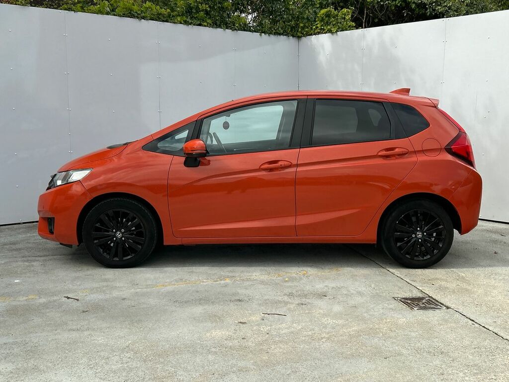 Compare Honda Jazz 1.3 Ex SE17LLK Orange