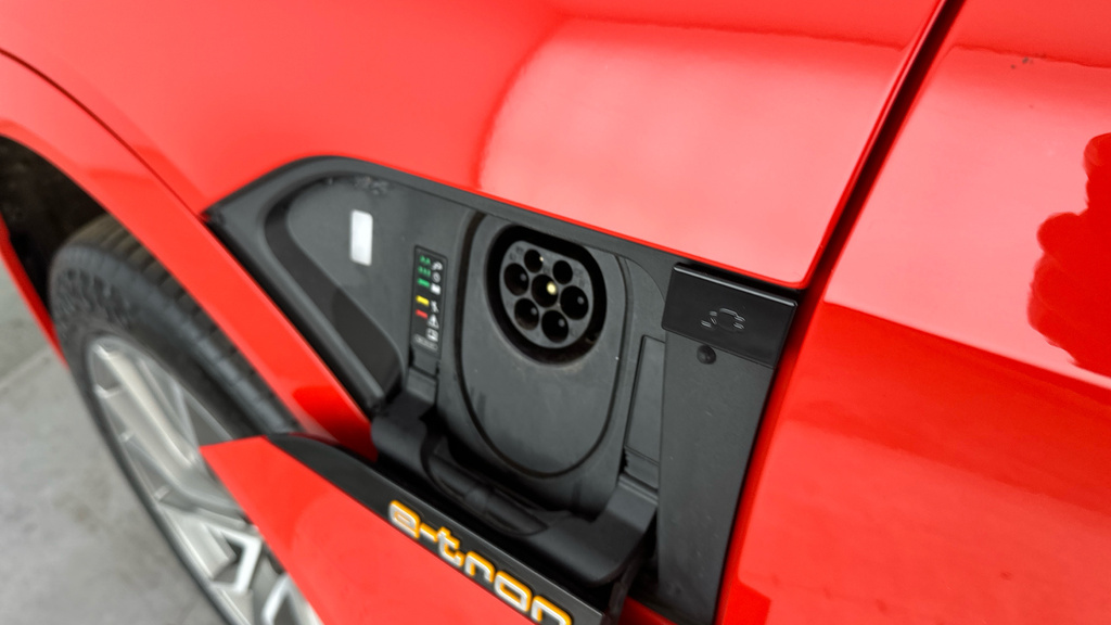 Compare Audi E-tron Launch Edition LF20CLO Red