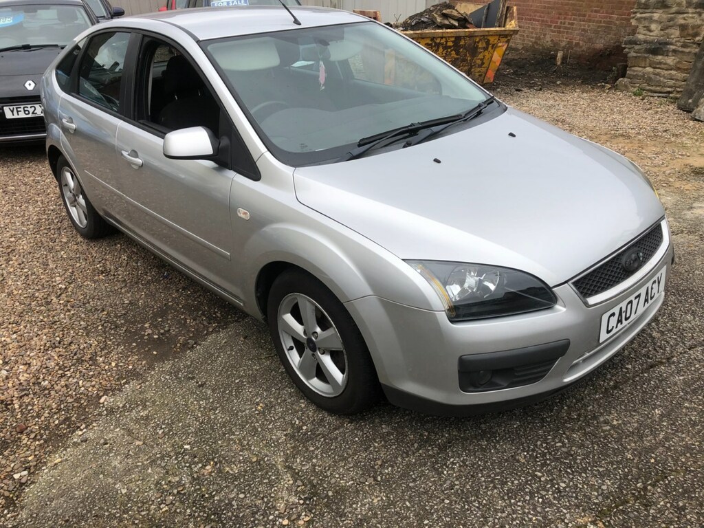 Compare Ford Focus 1.6 Zetec Climate Pack CA07ACY Silver