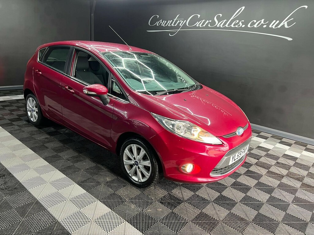 Compare Ford Fiesta 1.4 Zetec YL59FWY Red