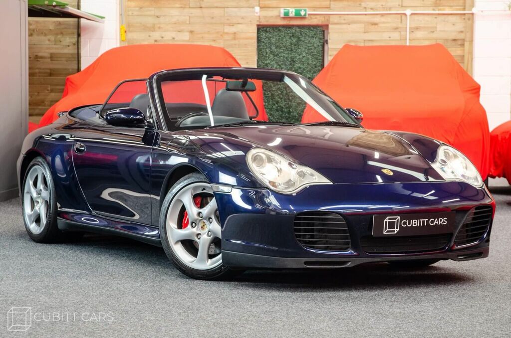 Compare Porsche 911 Convertible WX04MYD Blue