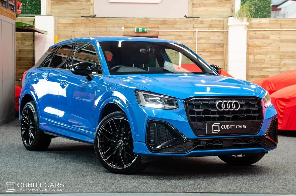 Compare Audi Q2 Suv YH21WLX Blue