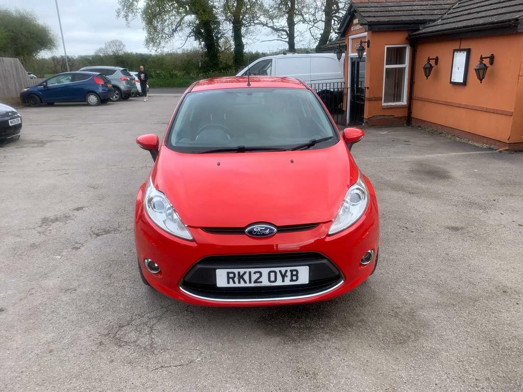 Compare Ford Fiesta 1.25 Zetec RK12OYB Red