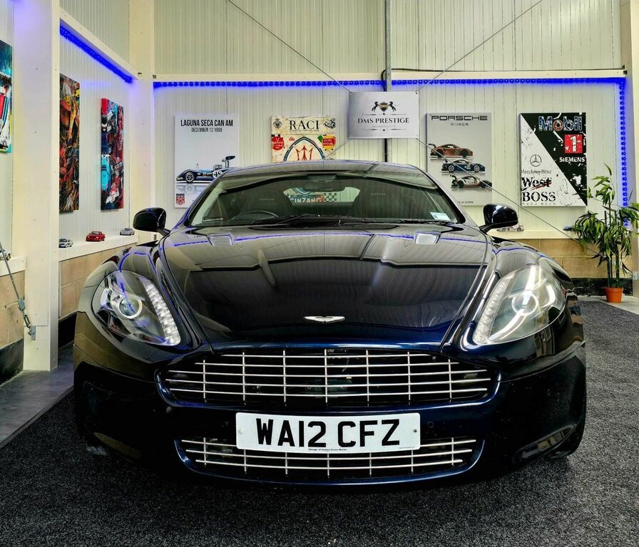 Compare Aston Martin Rapide Saloon 6.0 V12 Luxury Edition T-tronicii Euro 5 WA12CFZ Blue