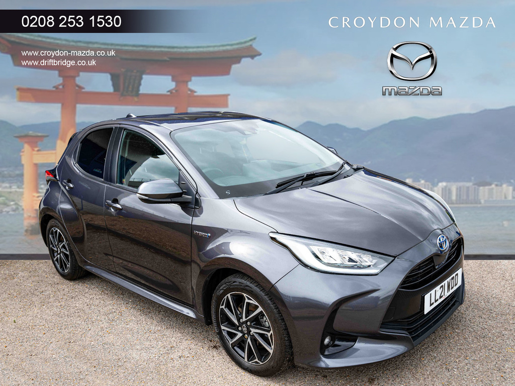 Compare Toyota Yaris 1.5 Hybrid Design Cvt LL21WDD Grey