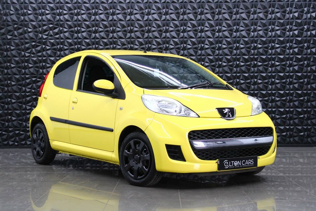 Compare Peugeot 107 1.0 12V Urban 2 Tronic Euro 4 WF60AXT Yellow