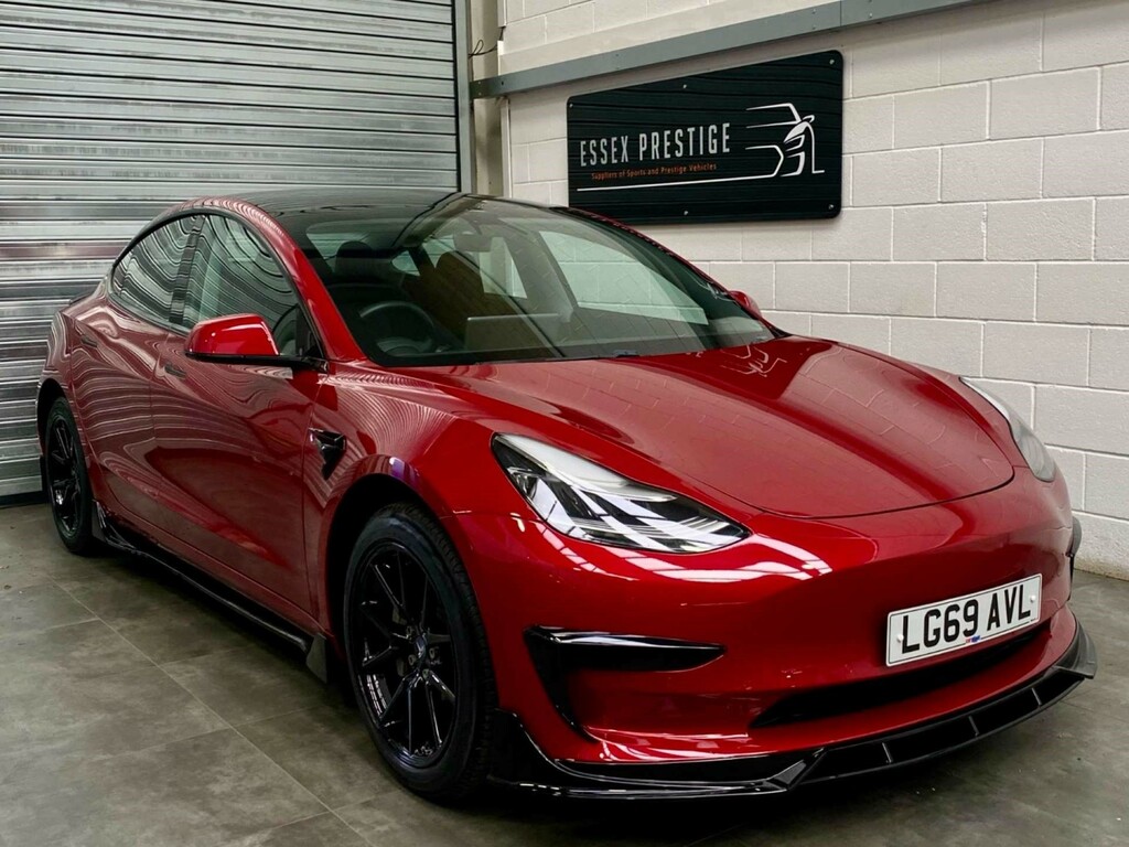 Compare Tesla Model 3 Standard-range LG69AVL Red