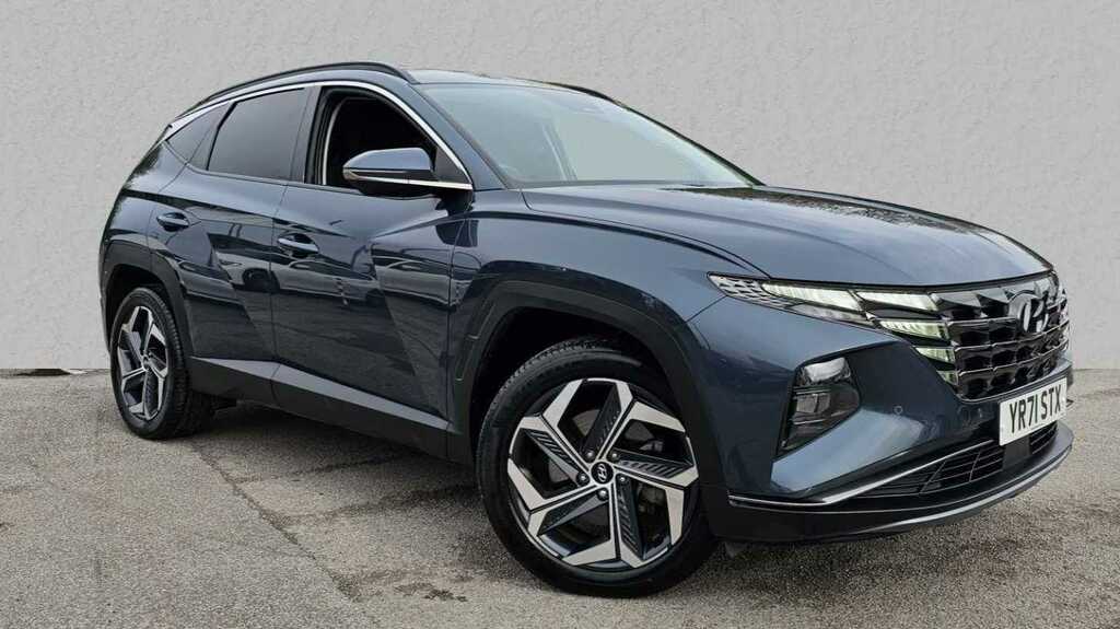 Compare Hyundai Tucson 1.6 Tgdi Hybrid 230 Premium 2Wd YR71STX Blue