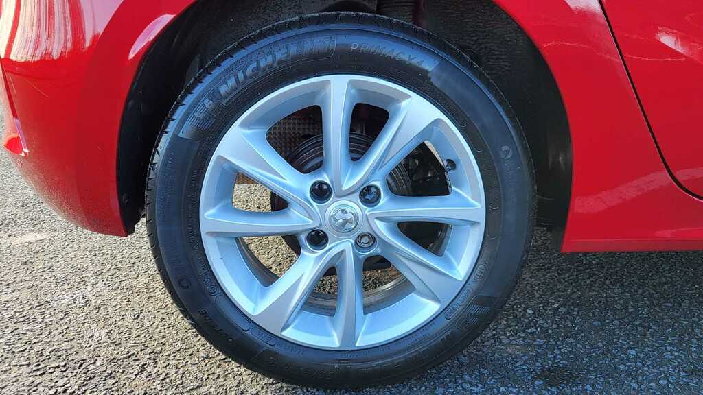 Compare Vauxhall Corsa 1.2 Se Premium ST20HBK Red