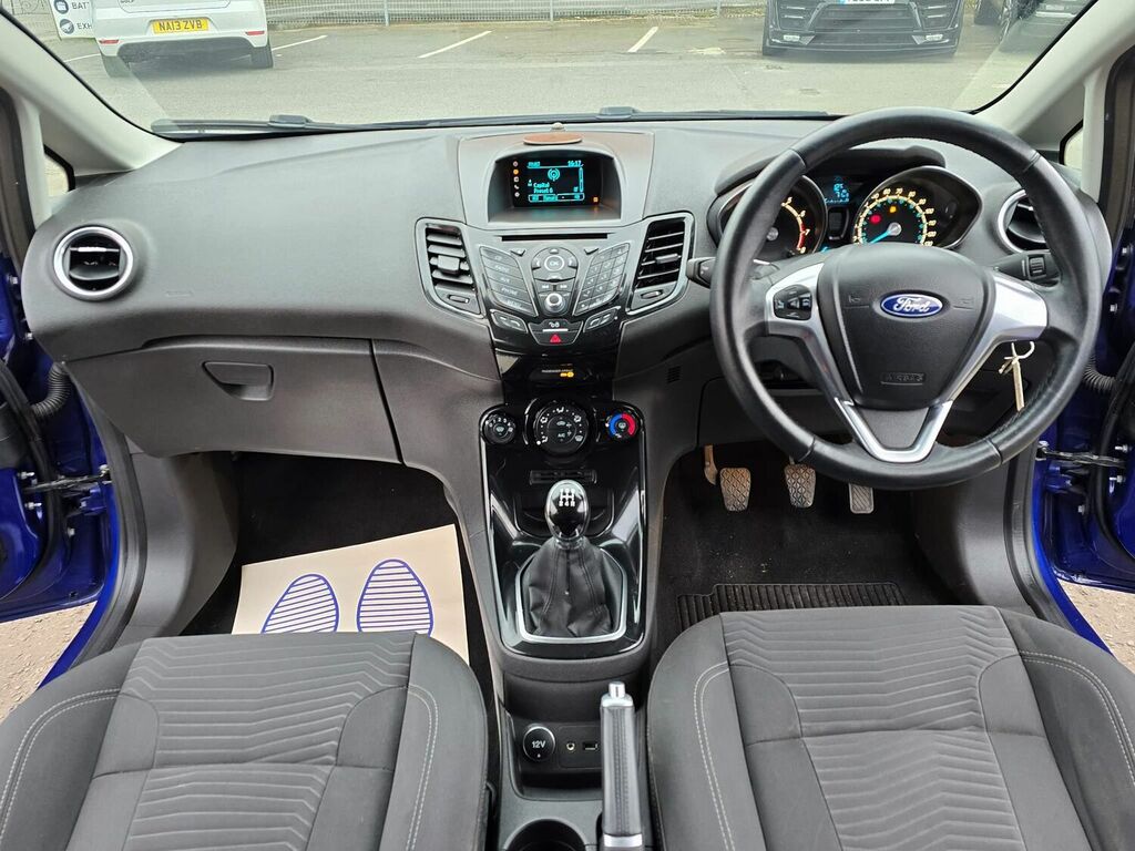 Compare Ford Fiesta Hatchback 1.25 Zetec Euro 6 201565 YG65EAA Blue