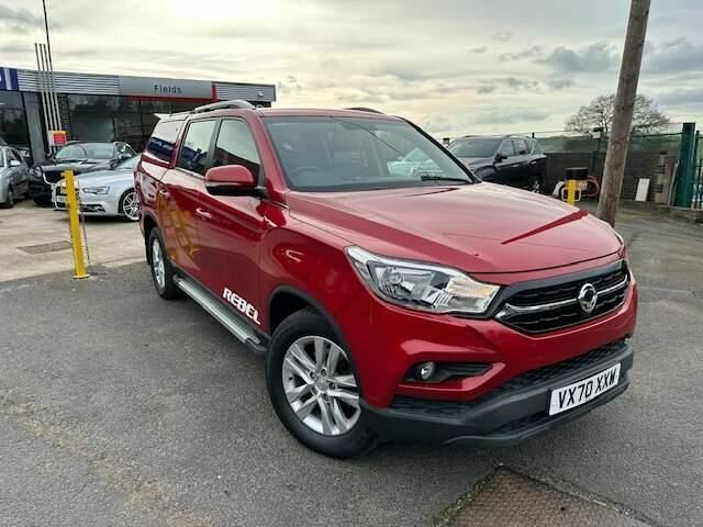 Compare SsangYong Musso Musso Rebel VX70XXW Red