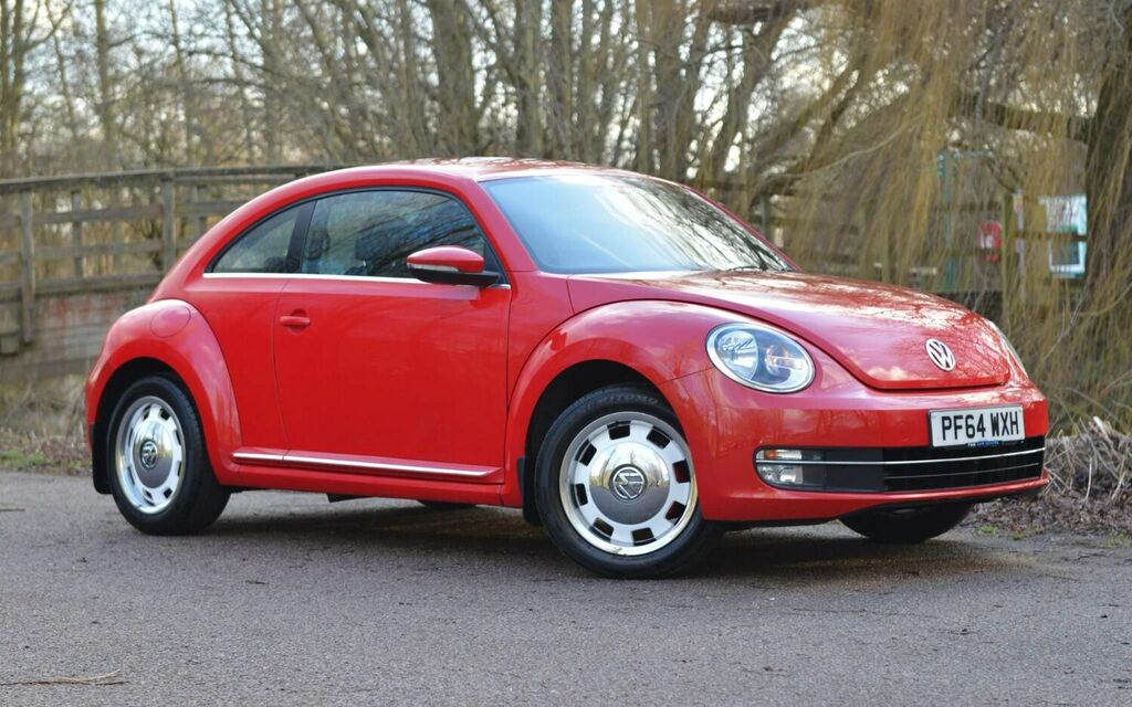 Compare Volkswagen Beetle Hatchback PF64WXH Red