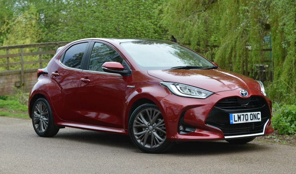 Compare Toyota Yaris Hatchback LM70ONC Red
