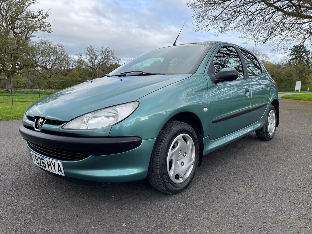 Compare Peugeot 206 1.4 LX Ac Y926HYA Green