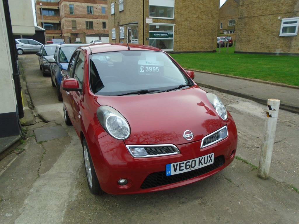 Compare Nissan Micra 1.2 16V N-tec VE60KUX Red