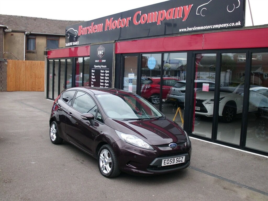 Compare Ford Fiesta 1.4 Style EO59SGZ Red