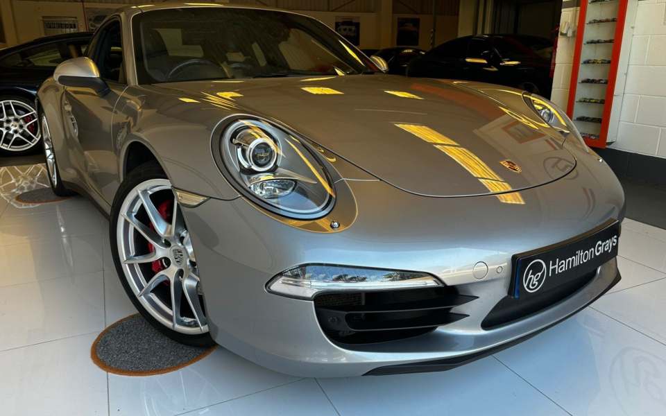 Compare Porsche 911 Petrol  Silver