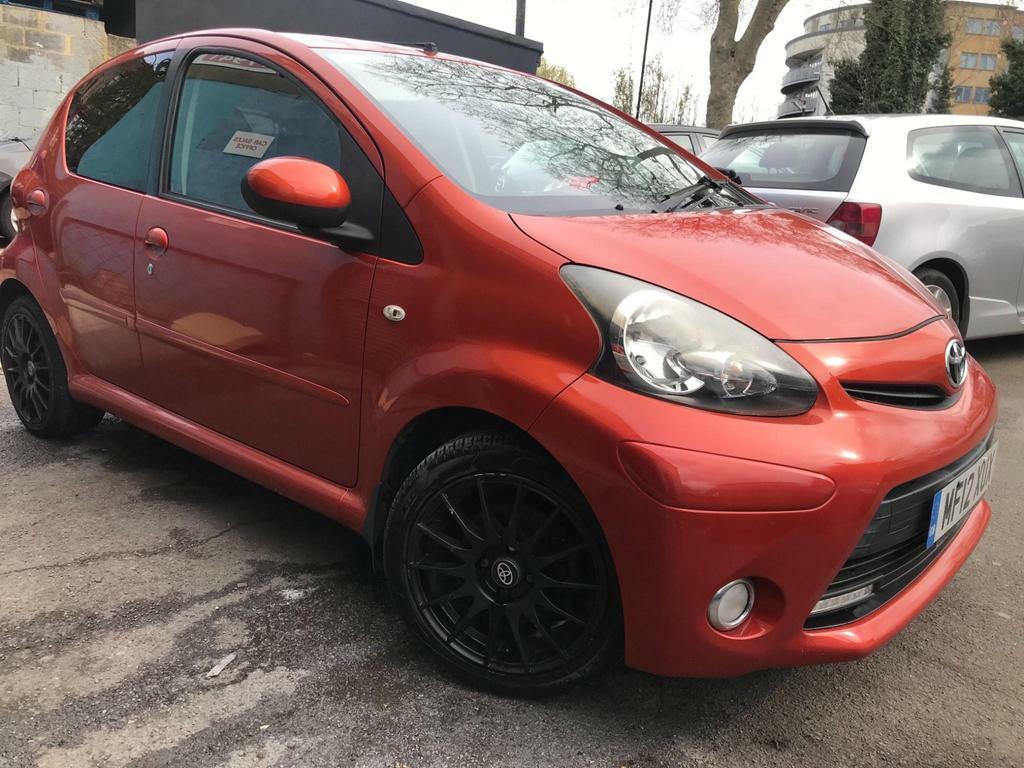 Compare Toyota Aygo 1.0 Vvt-i Fire Euro 5 MF12XUX Red