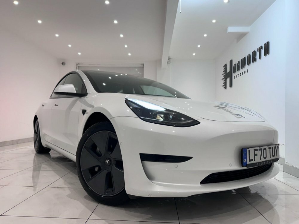 Compare Tesla Model 3 Standard Range Plus LF70TUY White