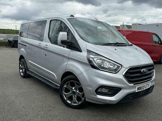 Compare Ford Transit Custom 300 L1 H1 Limited 2.0 Ecoblue Double Cab 130Ps Aut MW69OTV Silver