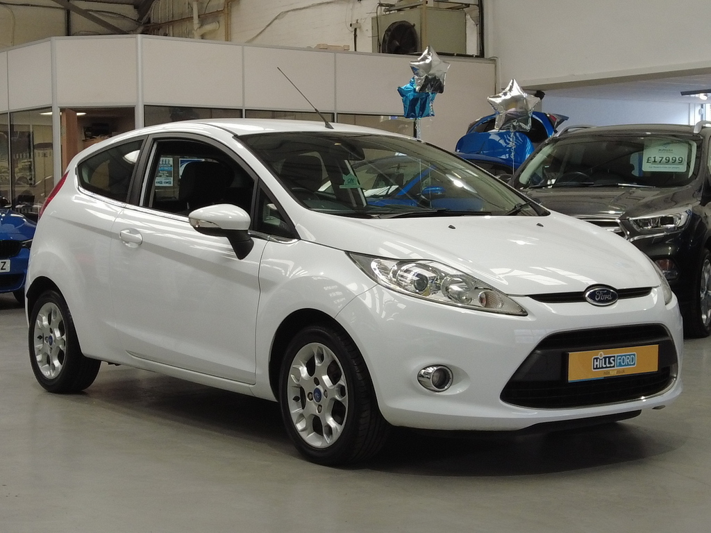 Compare Ford Fiesta Zetec 1.2L Great First Car - Low Road Tax YP62YXO White