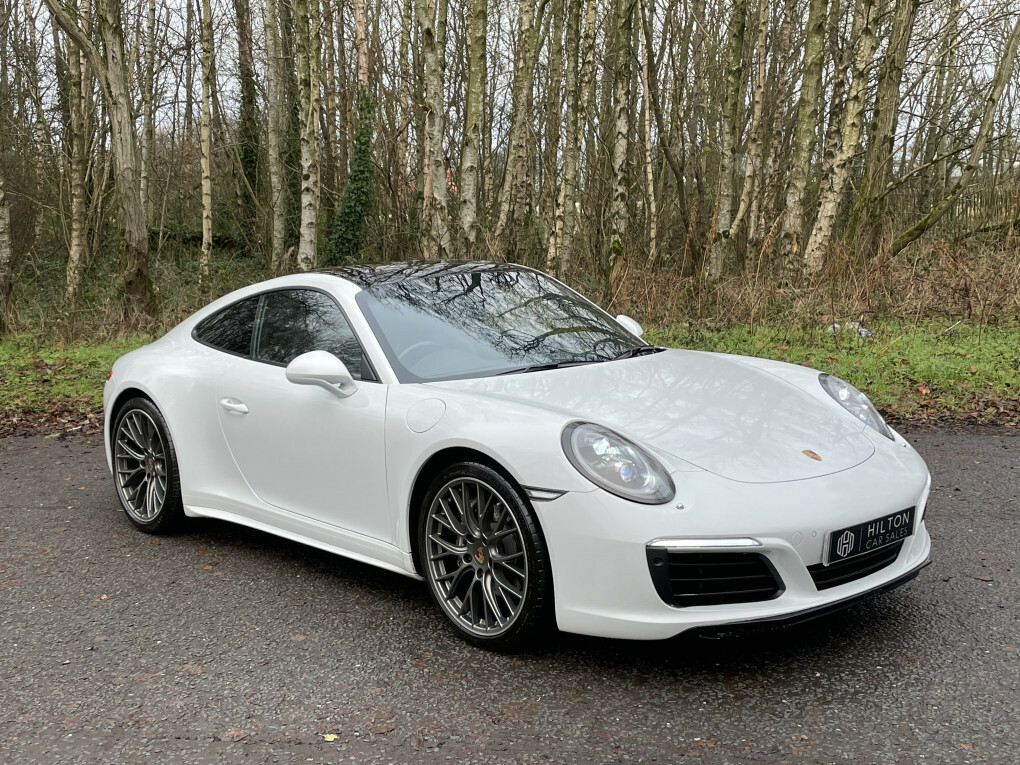 Compare Porsche 911 911 Carrera 4 D1AVK White