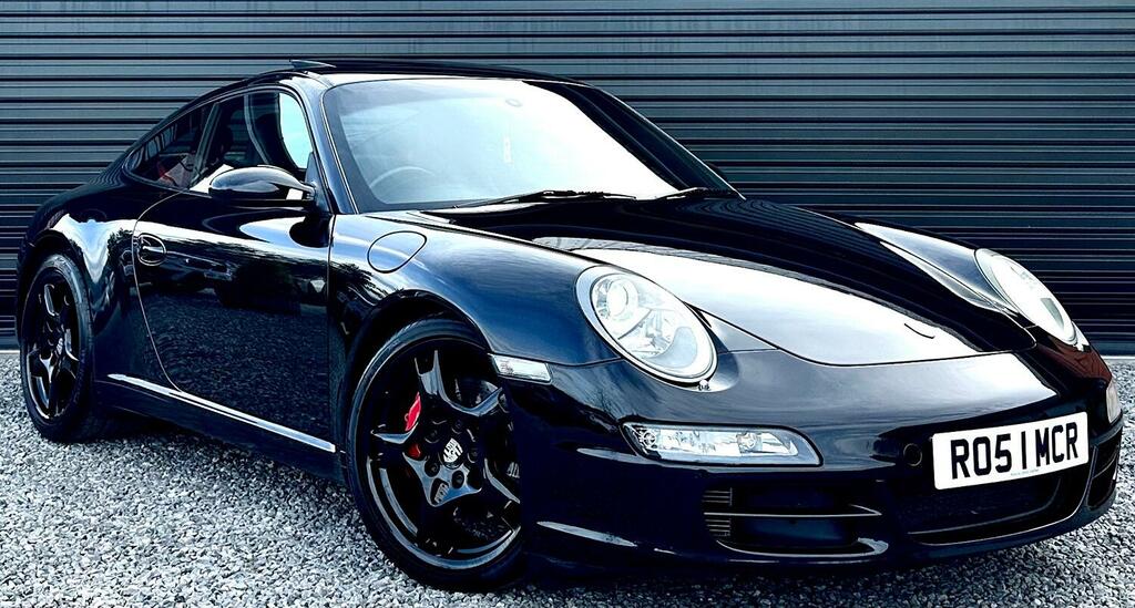 Compare Porsche 911 Coupe 3.8 RO51MCR Black