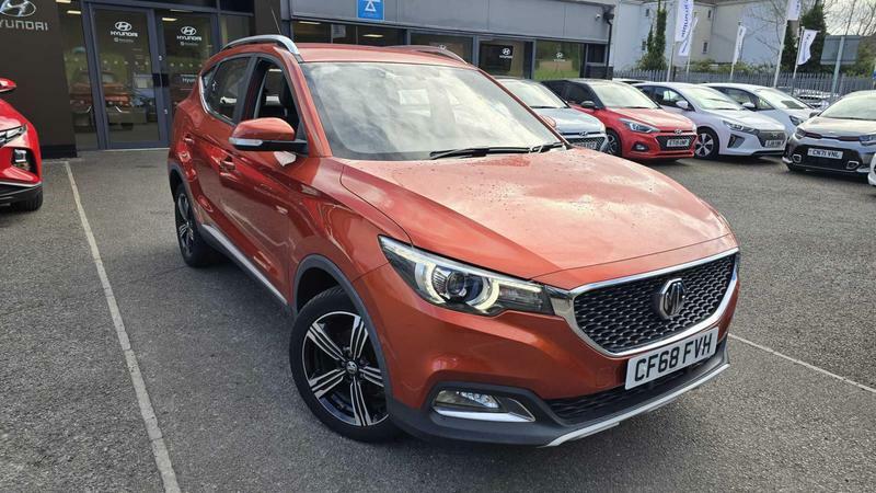Compare MG ZS Exclusive 1.5 CF68FVH Orange