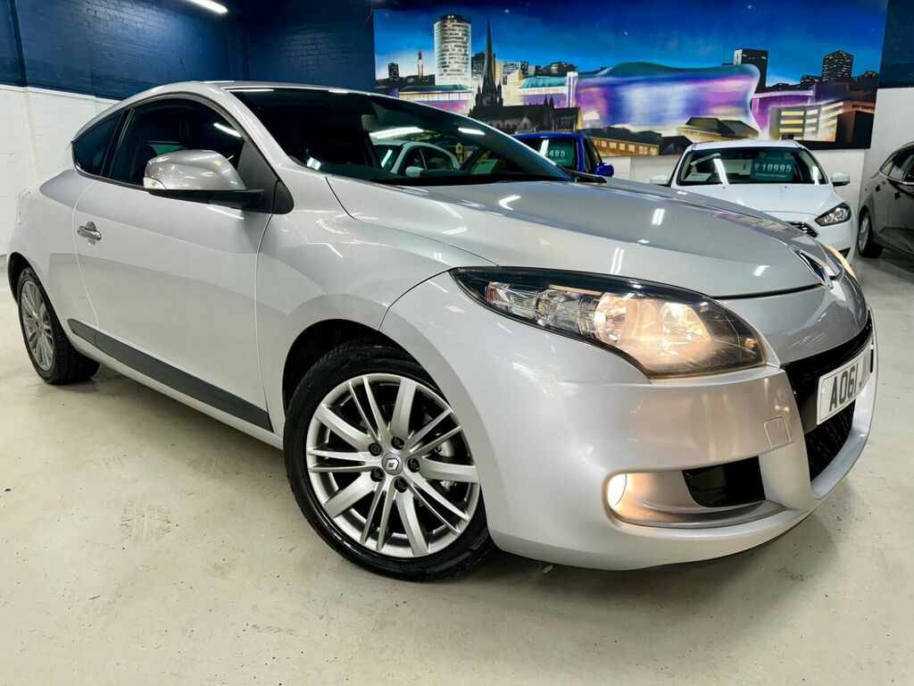 Compare Renault Megane Coupe 1.4 AO61JKN Silver