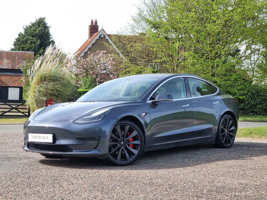 Compare Tesla Model 3 Electric YH20BHK 