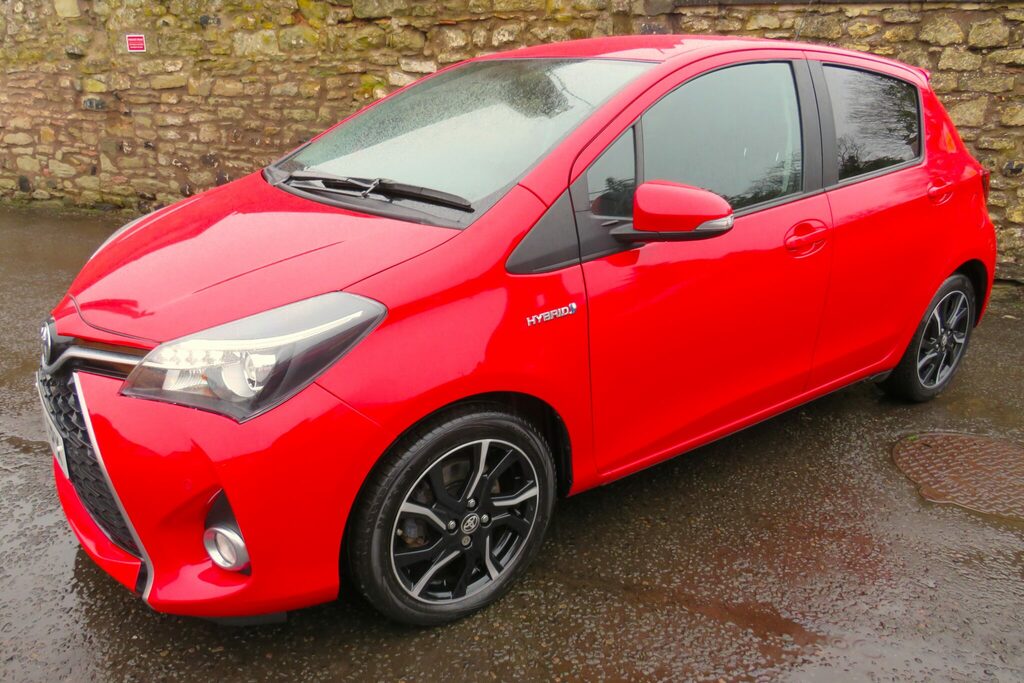 Compare Toyota Yaris Design Hybrid SO65FPX Red