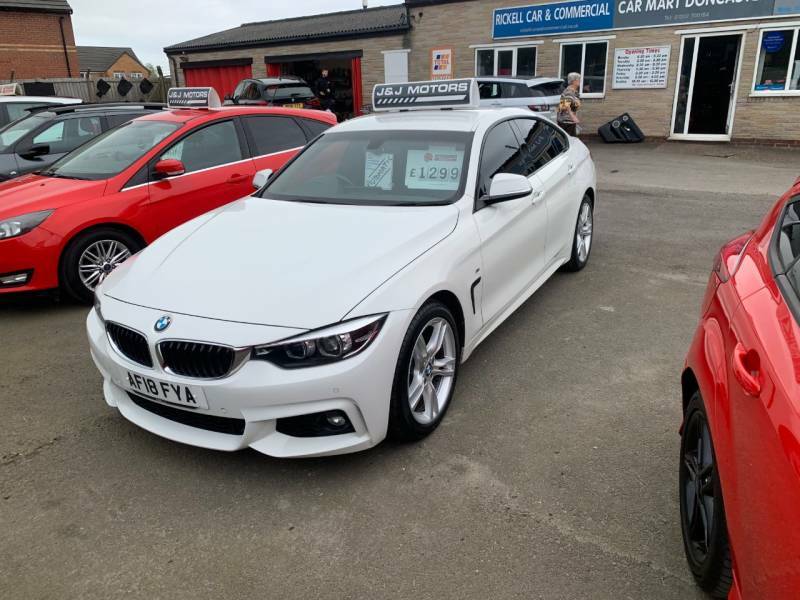 Compare BMW 4 Series Coupe AF18FYA White