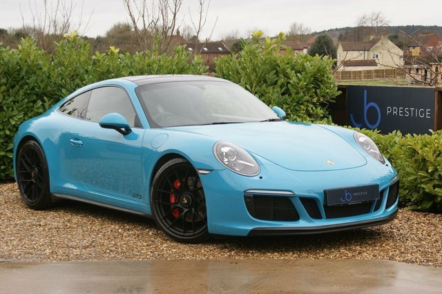 Compare Porsche 911 911 Carrera Gts S-a GP18NUY Blue