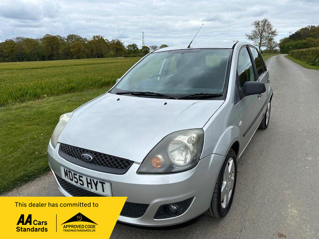 Compare Ford Fiesta 1.25 Zetec Climate Hatchback MD55HYT Silver