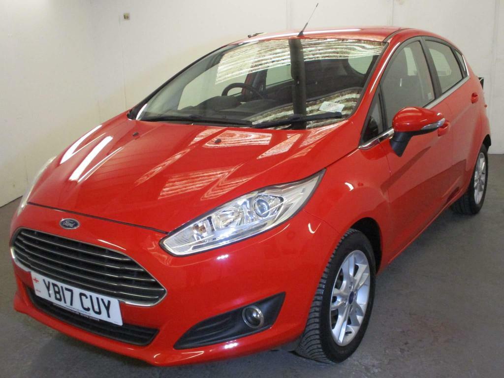 Compare Ford Fiesta 1.25 Zetec Euro 6 YB17CUY Red