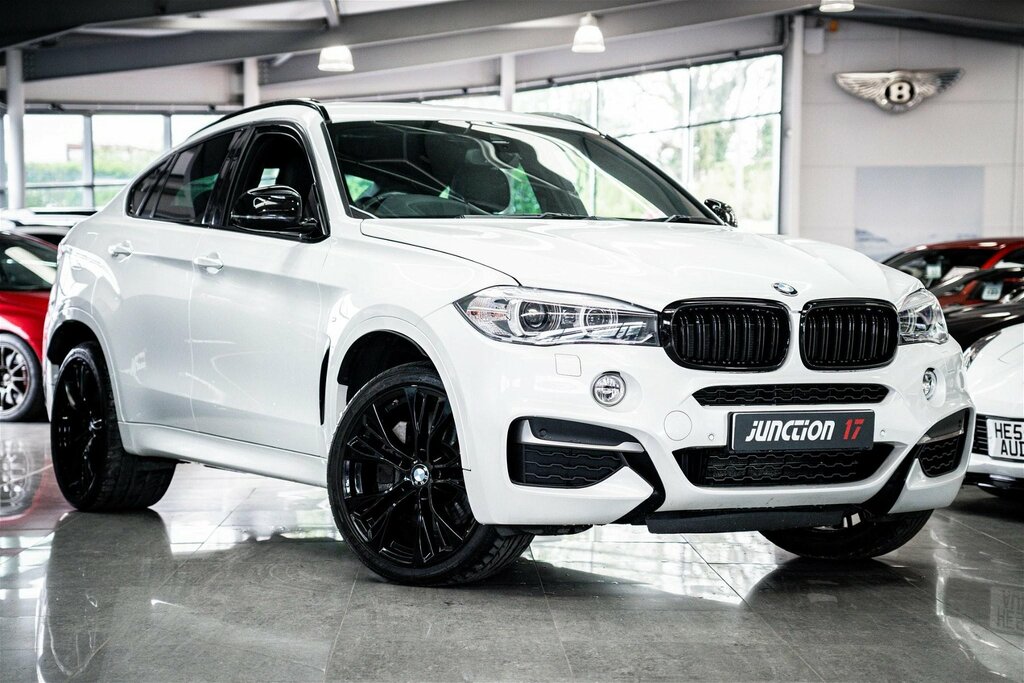 Compare BMW X6 M50d SD18ZPK White