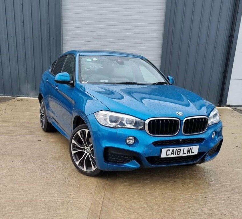 Compare BMW X6 Xdrive30d M Sport Edition CA18LWL Blue
