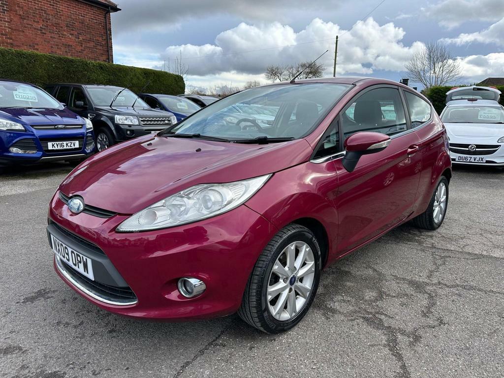Compare Ford Fiesta 1.4 Zetec NX09OPW Red