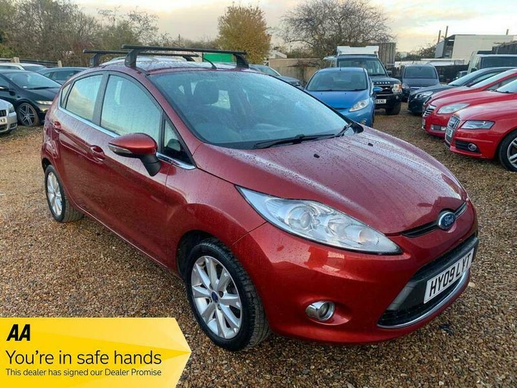 Compare Ford Fiesta 1.4 Zetec HY09LYT Red