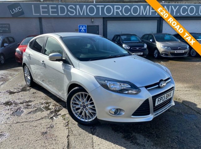Compare Ford Focus Hatchback FP13BNX Silver