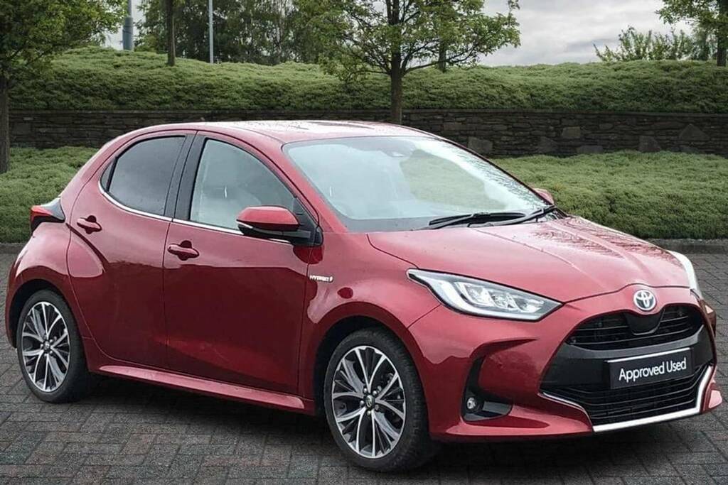 Compare Toyota Yaris 1.5 Hybrid Excel Cvt Panoramic Roof VE70XFX Red