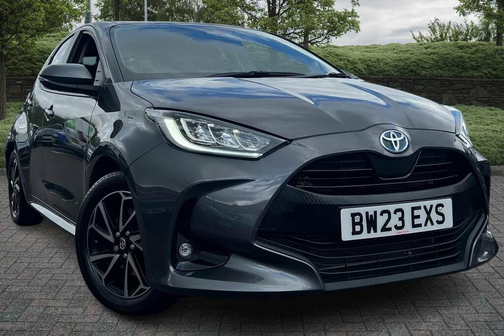 Compare Toyota Yaris 1.5 Hybrid Design Cvt BW23EXS Grey
