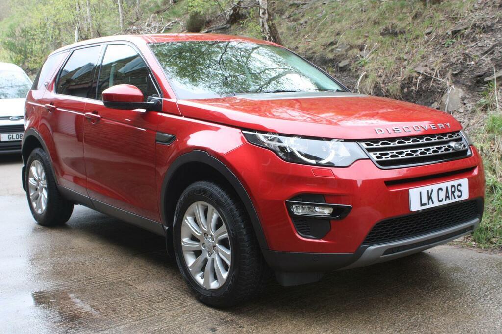 Compare Land Rover Discovery Sport Sport 2.0 MK65FCL Red