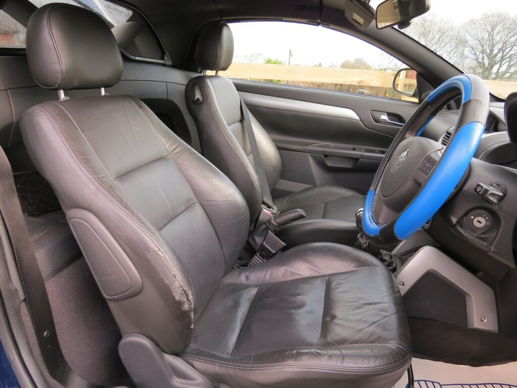 Compare Vauxhall Tigra 1.8I 16V Sport LM54EDK Blue