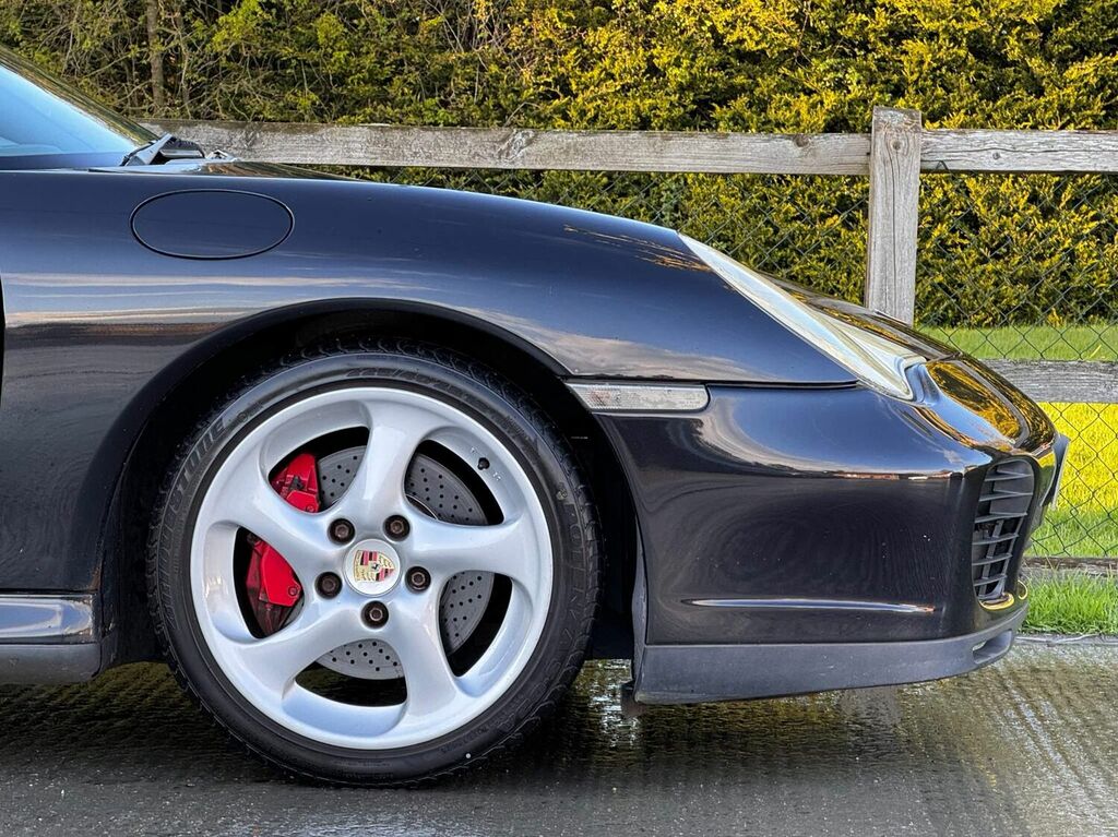 Compare Porsche 911 Coupe 3.6 996 Carrera 4S Tiptronic S Awd 2003 Y1KEX Black